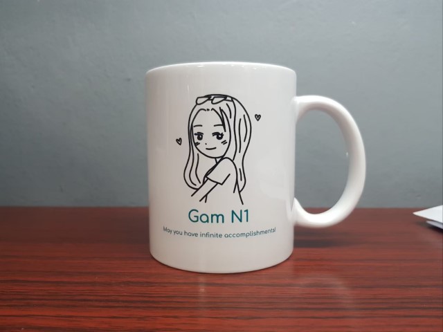 สกรีนแก้วมัคสีขาวรูปภาพเเละข้อความ Gam N1